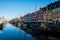 Nyhavn pier with buildings and boats reflected in water, Copenhagen, Denmark Ð’Â Ð’Â 